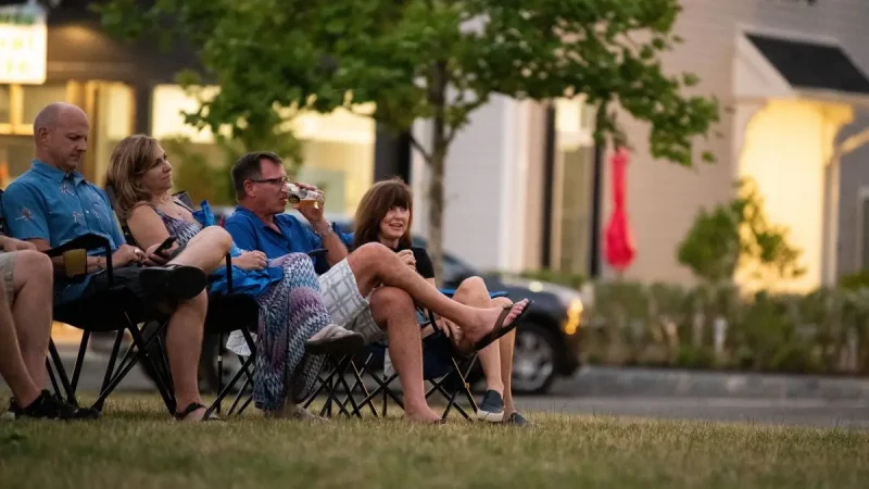 Evening the grown-ups enjoy Summer Movie Night as Hastings